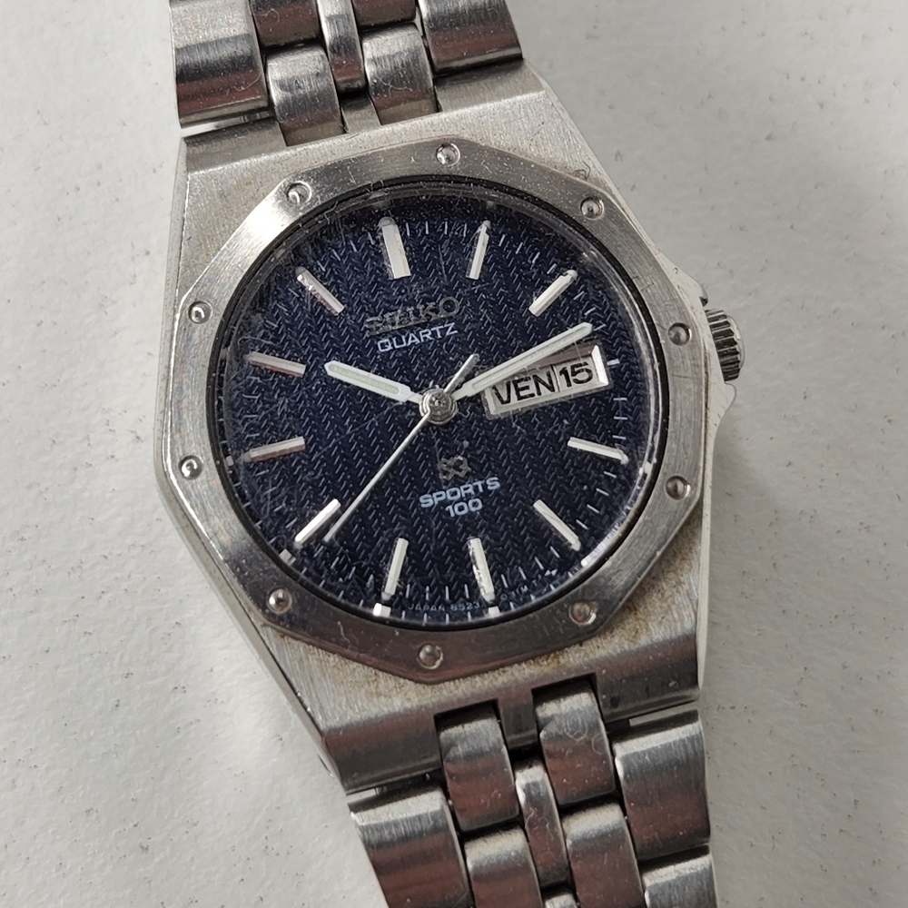 Seiko SQ 100 Day date Royal Oak style watch